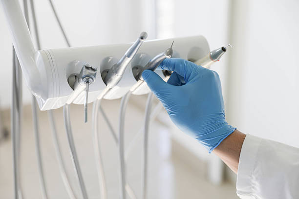 Professional Tooth Extraction technician working in Warsaw, IN